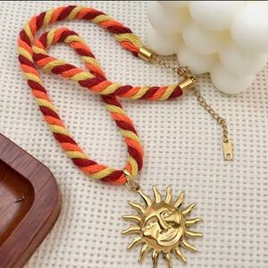 Sun Pendant Necklace with Red and Yellow Cord
